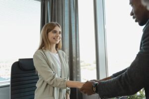 Handshake between man and woman