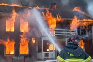 A firefighter extinguishing a fire