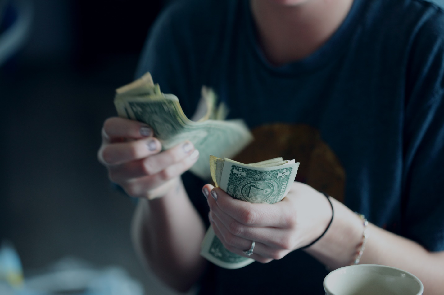 A civil service officer counting her salary